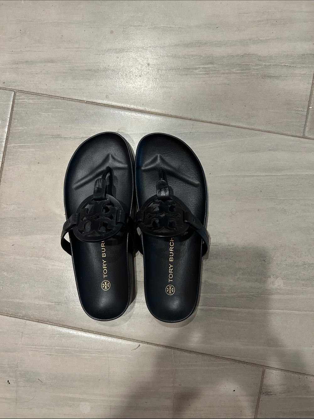 Tory Burch Black Miller sandals.